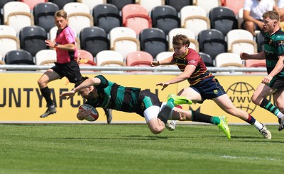 100525 - Cardiff Met Athletic v St Peters Athletic, Mens Division 5 Cup Final - Gwyn Davies of St Peters Athletic is tackled short of the line