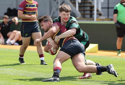 100525 - Cardiff Met Athletic v St Peters Athletic, Mens Division 5 Cup Final - Jason Trevino of Cardiff Met Athletic is tackled by Dylan Gittins of St Peters Athletic