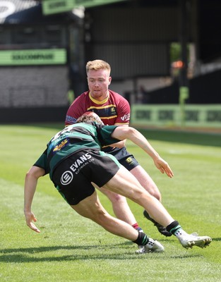 100525 - Cardiff Met Athletic v St Peters Athletic, Mens Division 5 Cup Final - Isaac O'Connell of Cardiff Met Athletic is tackled