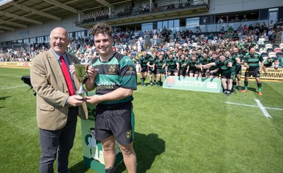 100525 - Cardiff Met Athletic v St Peters Athletic, Mens Division 5 Cup Final - St Peters Athletic captain George Mann receives the trophy from WRU President Terry Conner after winning the Division 5 final