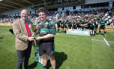 100525 - Cardiff Met Athletic v St Peters Athletic, Mens Division 5 Cup Final - St Peters Athletic captain George Mann receives the trophy from WRU President Terry Conner after winning the Division 5 final