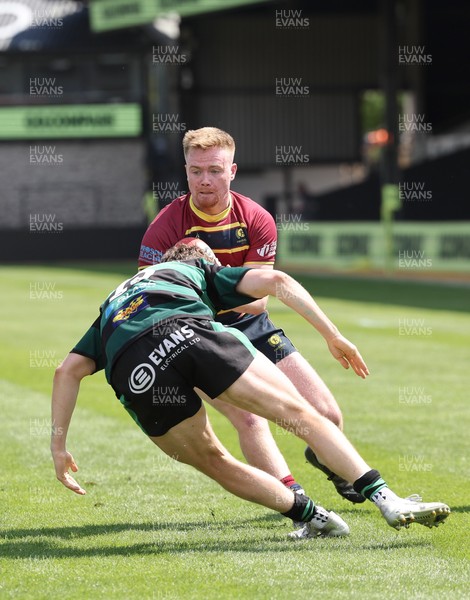 100525 - Cardiff Met Athletic v St Peters Athletic, Mens Division 5 Cup Final - Isaac O'Connell of Cardiff Met Athletic is tackled