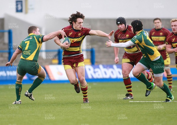 211213 Cardiff Metropolitan RFC v Bridgend Athletic RFC - Swalec Championhip -Emerson Bessell of Cardiff Met takes on Ben Howe(7) and Josh White of Bridgend Athletic