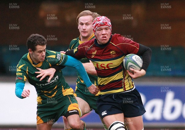 211213 Cardiff Metropolitan RFC v Bridgend Athletic RFC - Swalec Championhip -Sam Cross of Cardiff Met takes on Kyle Dobbings of Bridgend Athletic