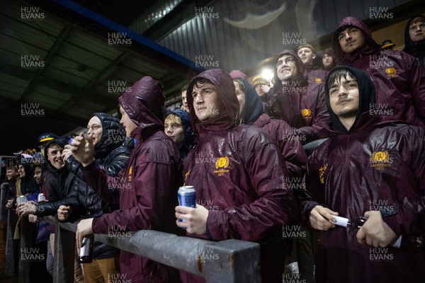 160222 - Picture shows Cardiff Met University RFC, the programme which is producing international rugby players - Fans brave the weather during their game with Swansea University