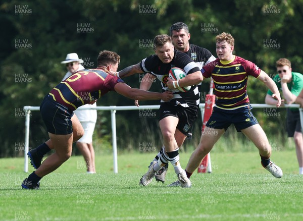 090923 - Cardiff Met v Bedwas RFC, Admiral Championship East - James Dixon of Bedwas takes on Evan Sheldon of Cardiff Met