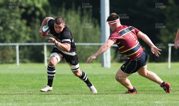 090923 - Cardiff Met v Bedwas RFC, Admiral Championship East - Dale Rogers of Bedwas takes on Ben Murphy of Cardiff Met