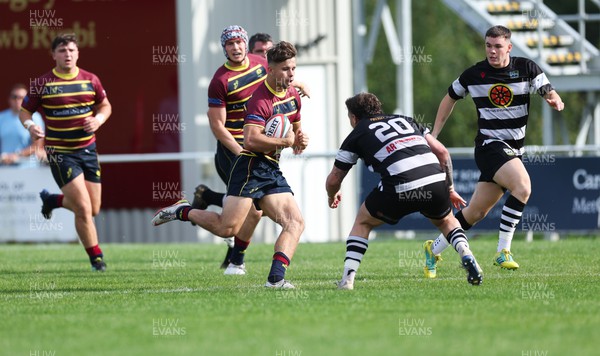 090923 - Cardiff Met v Bedwas RFC, Admiral Championship East - Jake Thomas of Cardiff Met takes on James Dixon of Bedwas