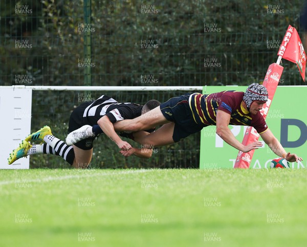 090923 - Cardiff Met v Bedwas RFC, Admiral Championship East - Joshuah Carrington of Cardiff Met dives in to score try