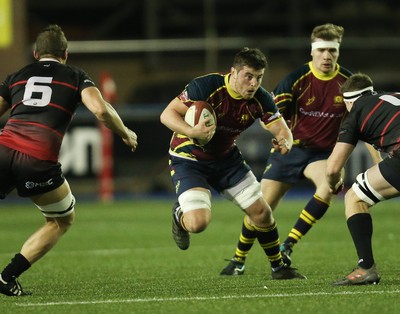 121218 - Cardiff Met v Cardiff University, BUCS Super League - Harvey Scott of Cardiff Met charges forward