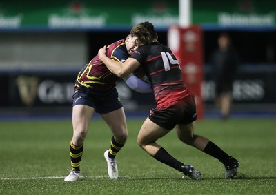 121218 - Cardiff Met v Cardiff University, BUCS Super League - Tom Benjamin of Cardiff Met is tackled by Adam Sadbri of Cardiff University