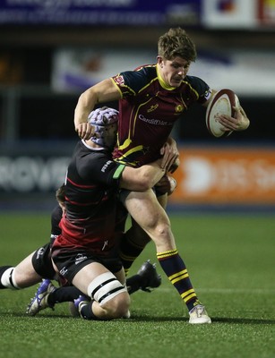 121218 - Cardiff Met v Cardiff University, BUCS Super League - Luke Northmore of Cardiff Met is tackled