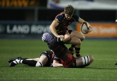 121218 - Cardiff Met v Cardiff University, BUCS Super League - Luke Northmore of Cardiff Met is tackled