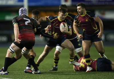 121218 - Cardiff Met v Cardiff University, BUCS Super League - Matt Marsh of Cardiff Met breaks away