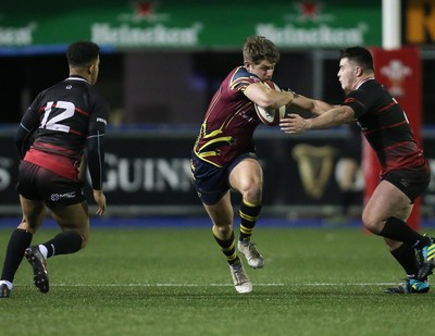 121218 - Cardiff Met v Cardiff University, BUCS Super League - Luke Northmore of Cardiff Met is tackled