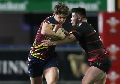 121218 - Cardiff Met v Cardiff University, BUCS Super League - Luke Northmore of Cardiff Met is tackled