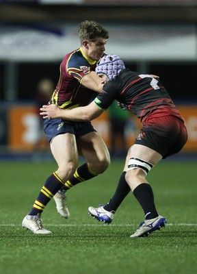 121218 - Cardiff Met v Cardiff University, BUCS Super League - Luke Northmore of Cardiff Met takes on Seb Herold of Cardiff University