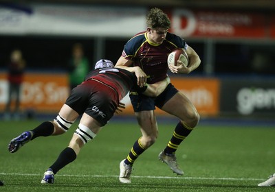 121218 - Cardiff Met v Cardiff University, BUCS Super League - Luke Northmore of Cardiff Met takes on Seb Herold of Cardiff University