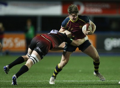 121218 - Cardiff Met v Cardiff University, BUCS Super League - Luke Northmore of Cardiff Met takes on Seb Herold of Cardiff University