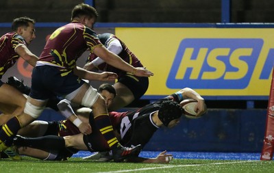 121218 - Cardiff Met v Cardiff University, BUCS Super League - Ioan Davies of Cardiff University reaches out to score try