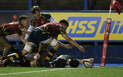 121218 - Cardiff Met v Cardiff University, BUCS Super League - Ioan Davies of Cardiff University reaches out to score try