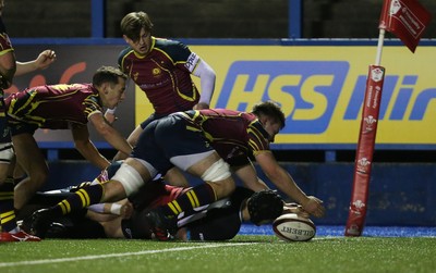 121218 - Cardiff Met v Cardiff University, BUCS Super League - Ioan Davies of Cardiff University reaches out to score try