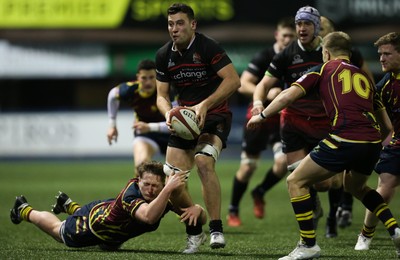 121218 - Cardiff Met v Cardiff University, BUCS Super League - Gareth Ansell of Cardiff University charges forward