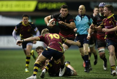 121218 - Cardiff Met v Cardiff University, BUCS Super League - Gareth Ansell of Cardiff University charges forward