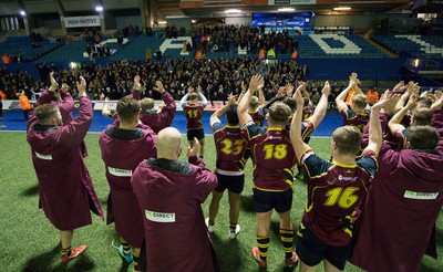 121218 - Cardiff Met v Cardiff University, BUCS Super League - Cardiff Met players celebrate with their supporters after beating Cardiff University