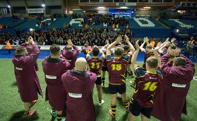 121218 - Cardiff Met v Cardiff University, BUCS Super League - Cardiff Met players celebrate with their supporters after beating Cardiff University