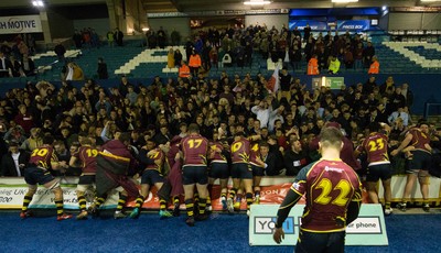 121218 - Cardiff Met v Cardiff University, BUCS Super League - Cardiff Met players celebrate with their supporters after beating Cardiff University