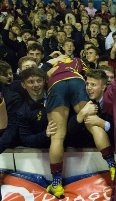 121218 - Cardiff Met v Cardiff University, BUCS Super League - Cardiff Met players celebrate with their supporters after beating Cardiff University