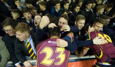 121218 - Cardiff Met v Cardiff University, BUCS Super League - Cardiff Met players celebrate with their supporters after beating Cardiff University