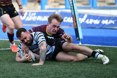 230526 - Cardiff Met v Glamorgan Wanderers - Mallet Cup Final - Reagan Moore of Glamorgan Wanderers runs in to score a try