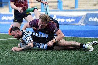 230526 - Cardiff Met v Glamorgan Wanderers - Mallet Cup Final - Reagan Moore of Glamorgan Wanderers runs in to score a try