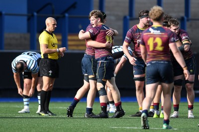 230526 - Cardiff Met v Glamorgan Wanderers - Mallet Cup Final - Cardiff Met players celebrate at full time after getting the win