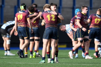 230526 - Cardiff Met v Glamorgan Wanderers - Mallet Cup Final - Cardiff Met players celebrate at full time after getting the win
