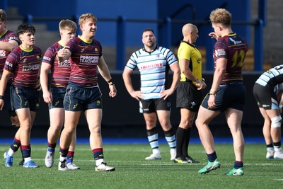 230526 - Cardiff Met v Glamorgan Wanderers - Mallet Cup Final - Cardiff Met players celebrate at full time after getting the win