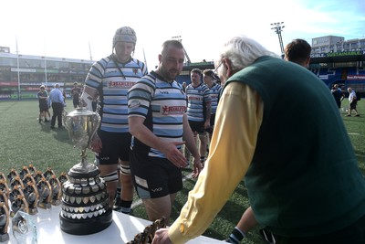 230526 - Cardiff Met v Glamorgan Wanderers - Mallet Cup Final - Glamorgan players collect their runners up medals at full time