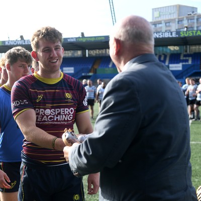 230526 - Cardiff Met v Glamorgan Wanderers - Mallet Cup Final - Cardiff met players collect their winners trophies at full time