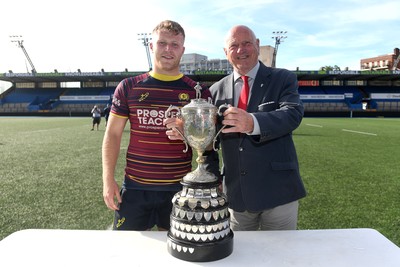 230526 - Cardiff Met v Glamorgan Wanderers - Mallet Cup Final - Ross McKay, (Captain) of Cardiff Met with the trophy at full time