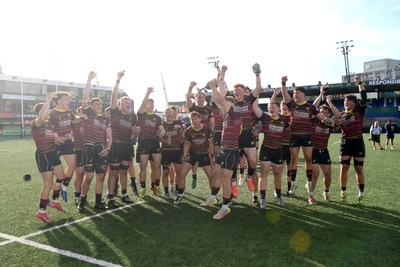 230526 - Cardiff Met v Glamorgan Wanderers - Mallet Cup Final - Cardiff met players celebrate lifting the Mallet cup at full time