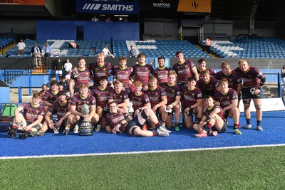 230526 - Cardiff Met v Glamorgan Wanderers - Mallet Cup Final - Cardiff met players celebrate lifting the Mallet cup at full time