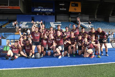 230526 - Cardiff Met v Glamorgan Wanderers - Mallet Cup Final - Cardiff met players celebrate lifting the Mallet cup at full time