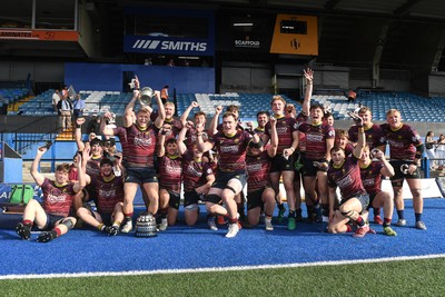 230526 - Cardiff Met v Glamorgan Wanderers - Mallet Cup Final - Cardiff met players celebrate lifting the Mallet cup at full time