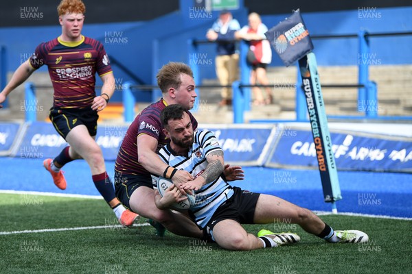 230526 - Cardiff Met v Glamorgan Wanderers - Mallet Cup Final - Reagan Moore of Glamorgan Wanderers runs in to score a try