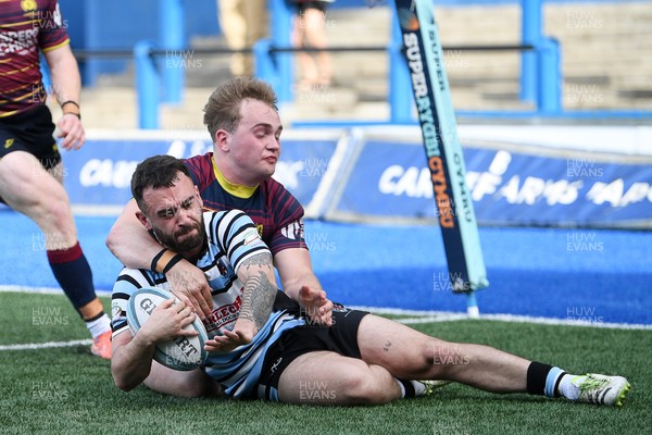 230526 - Cardiff Met v Glamorgan Wanderers - Mallet Cup Final - Reagan Moore of Glamorgan Wanderers runs in to score a try
