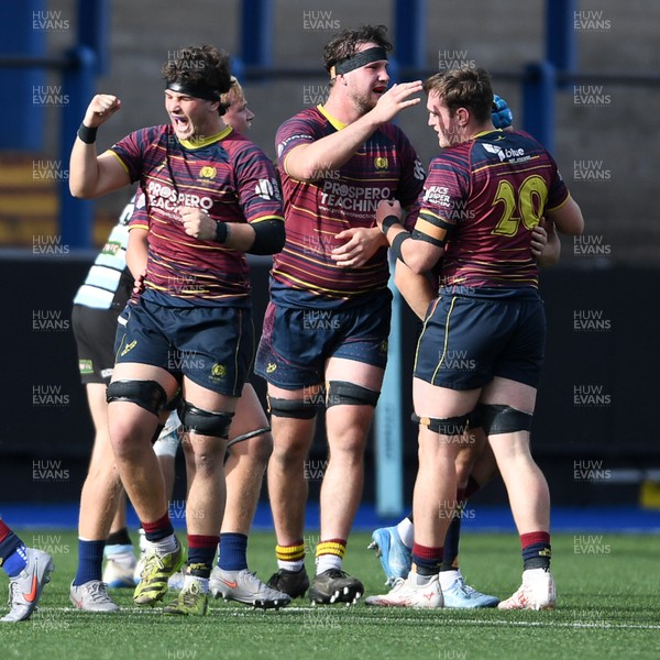 230526 - Cardiff Met v Glamorgan Wanderers - Mallet Cup Final - Cardiff Met players celebrate at full time after getting the win