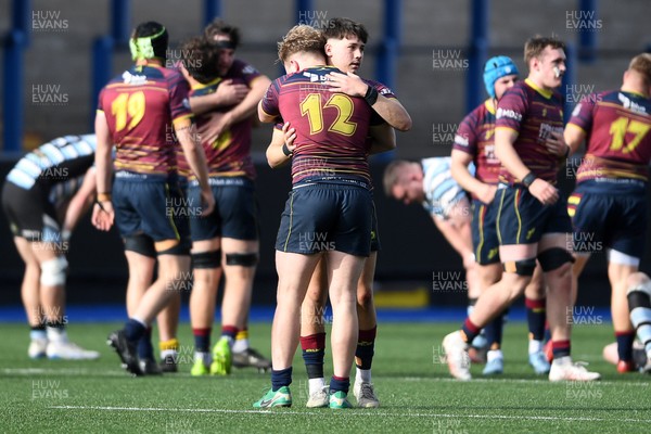 230526 - Cardiff Met v Glamorgan Wanderers - Mallet Cup Final - Cardiff Met players celebrate at full time after getting the win