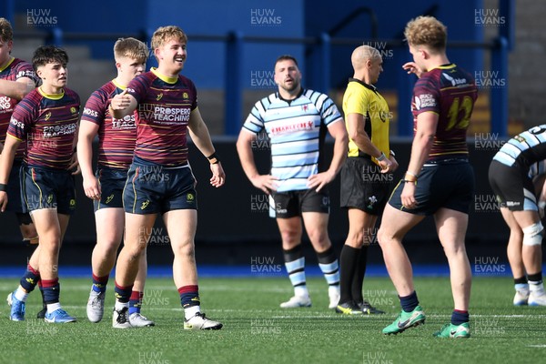 230526 - Cardiff Met v Glamorgan Wanderers - Mallet Cup Final - Cardiff Met players celebrate at full time after getting the win